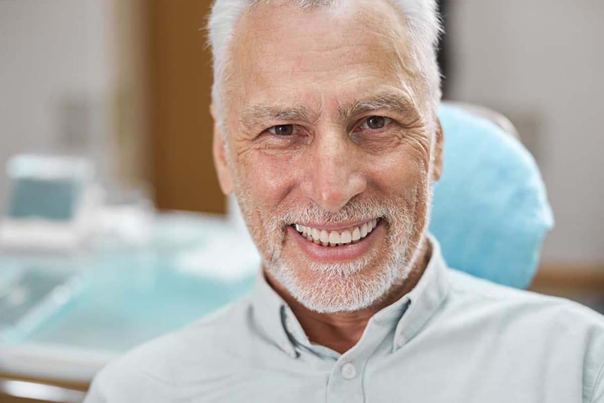 man smiling with beard